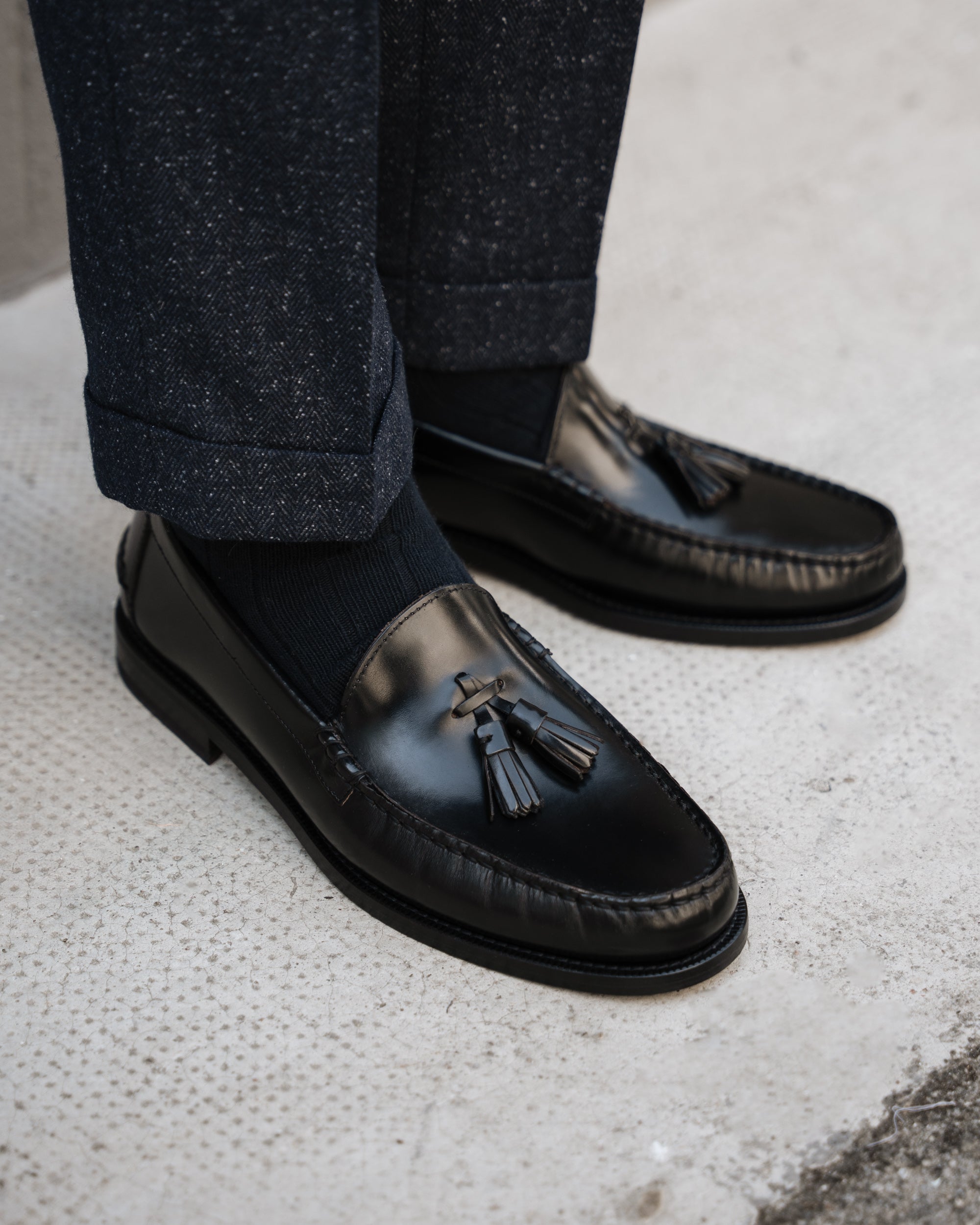 Velasca | Black leather tasseled loafers. Made in Italy